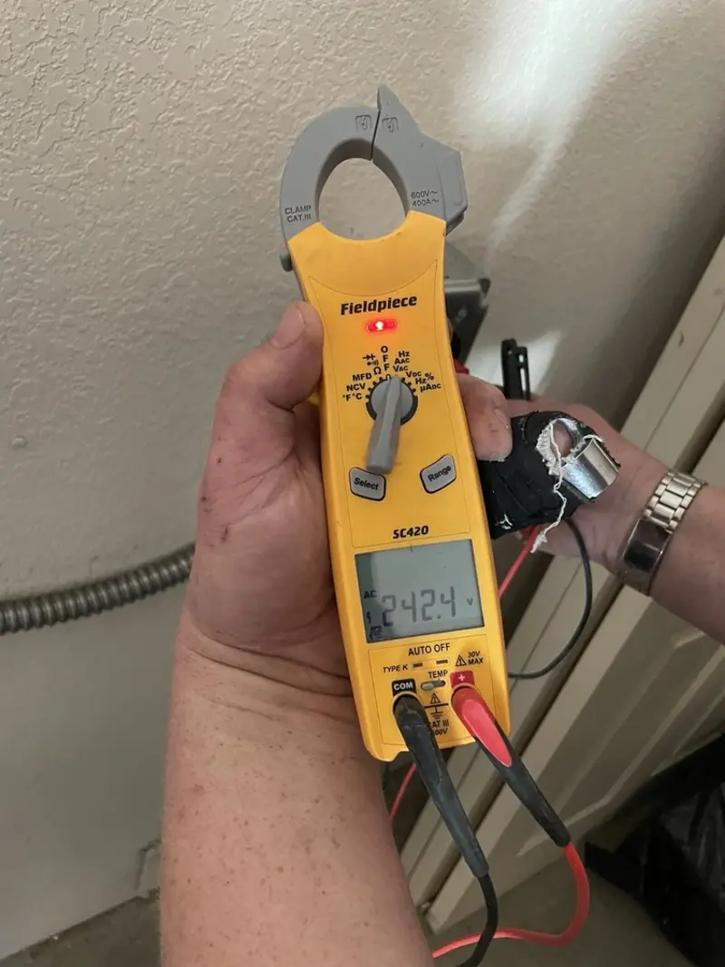 Voltage testing with clamp meter during Electrical Installation Services in Braintree Town